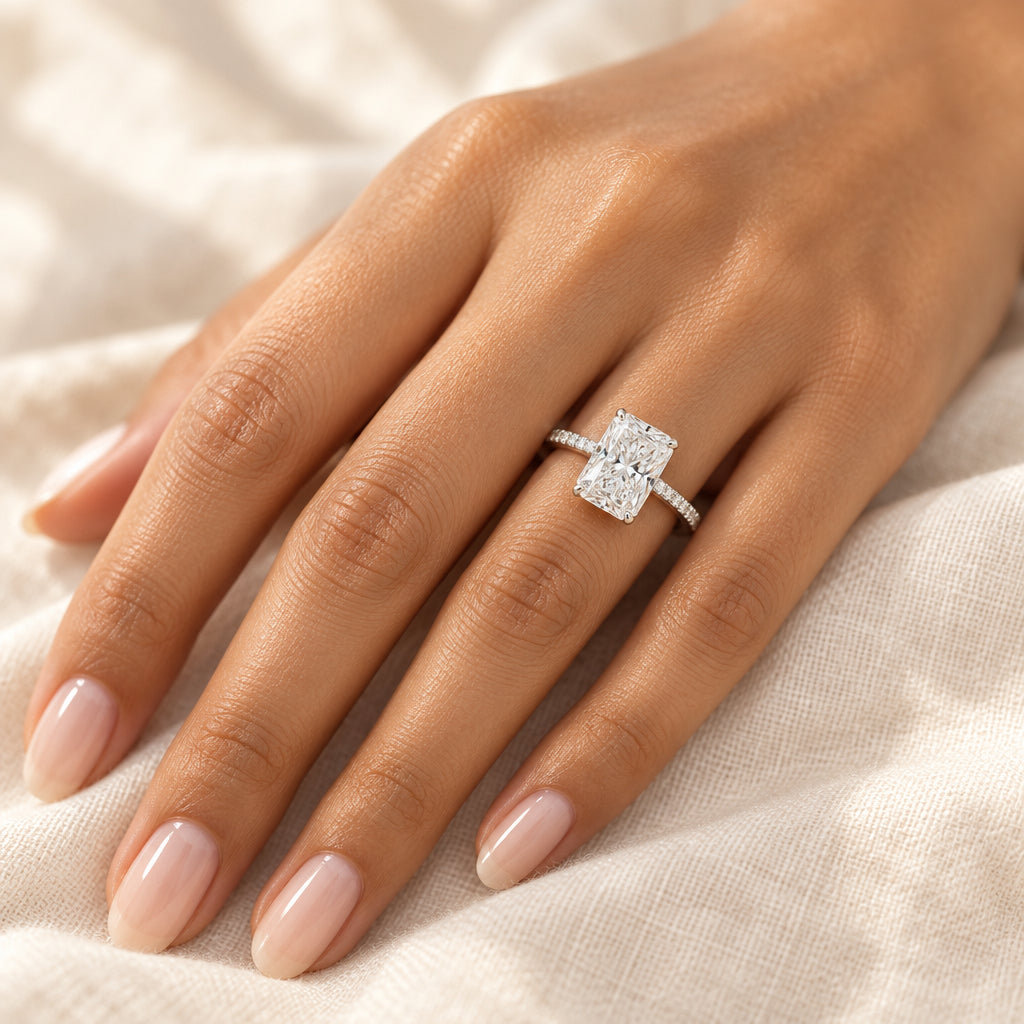 Mustika ring worn on hand